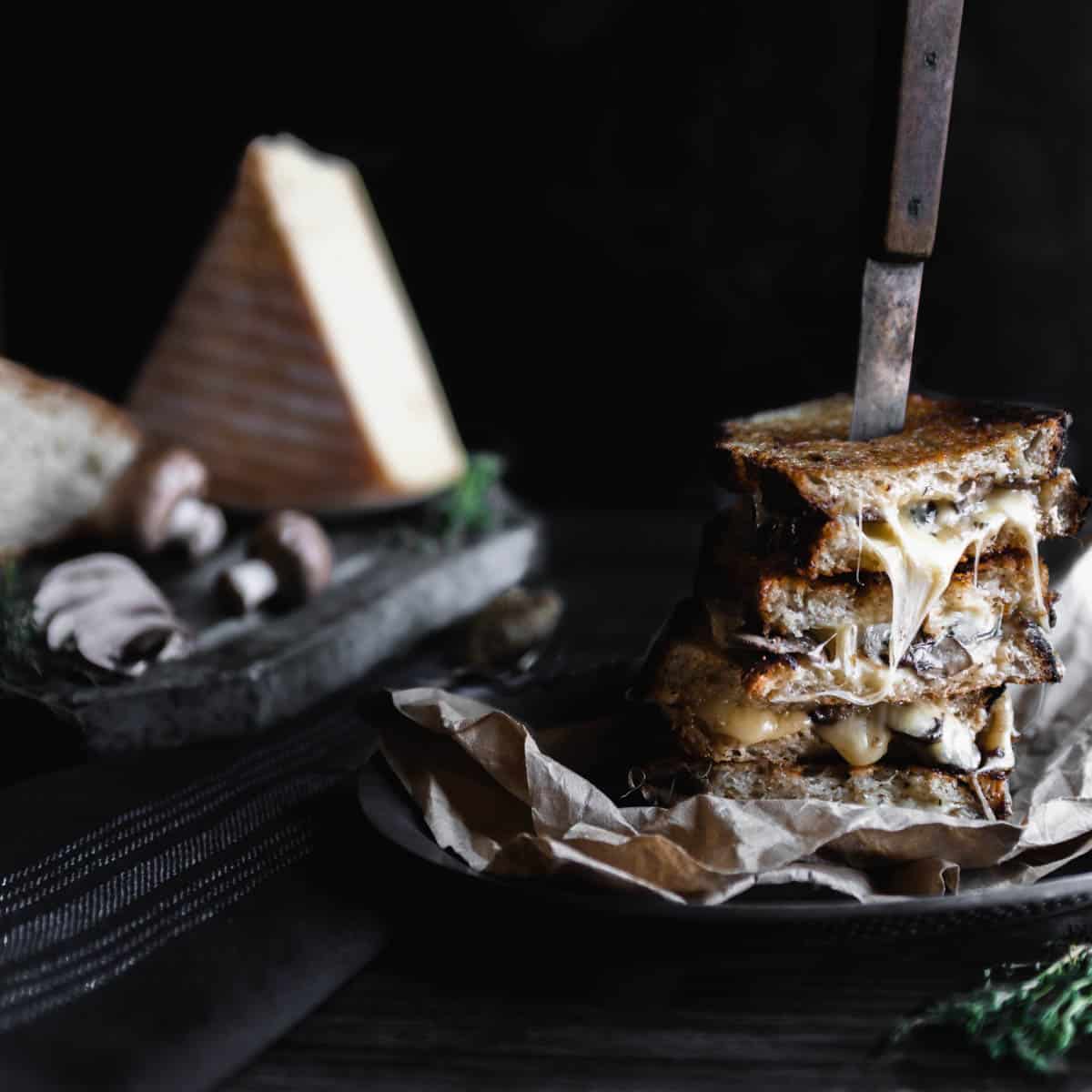 Stacked Raclette grilled cheese with mushrooms