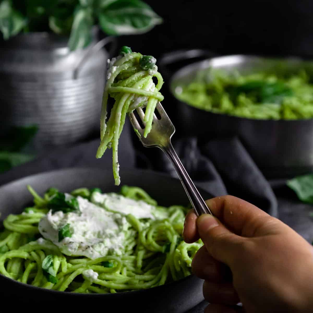 A bite of Green Pea Pasta on a fork