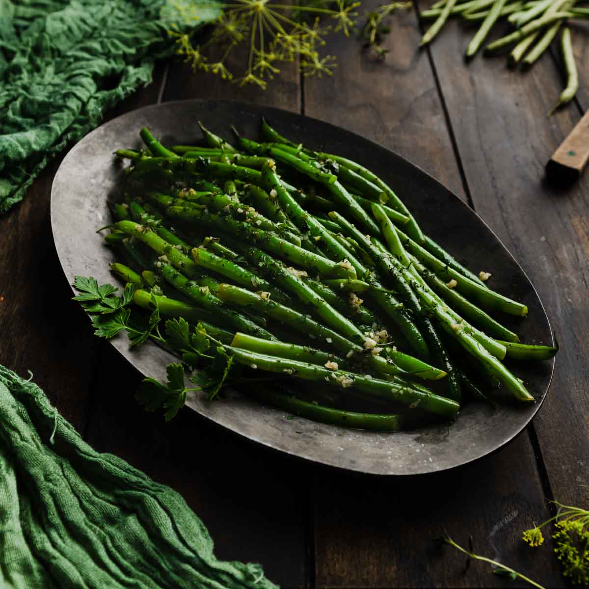A platter of French Green Beans in Garlic Herb Butter