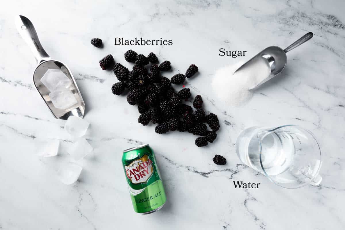 Ingredients for a homemade blackberry Shirley temple drink